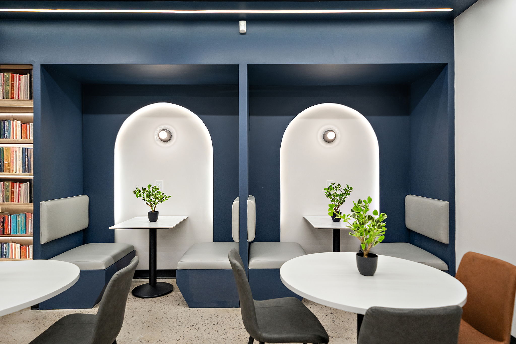 Members working in a bright Swivl shared workspace
